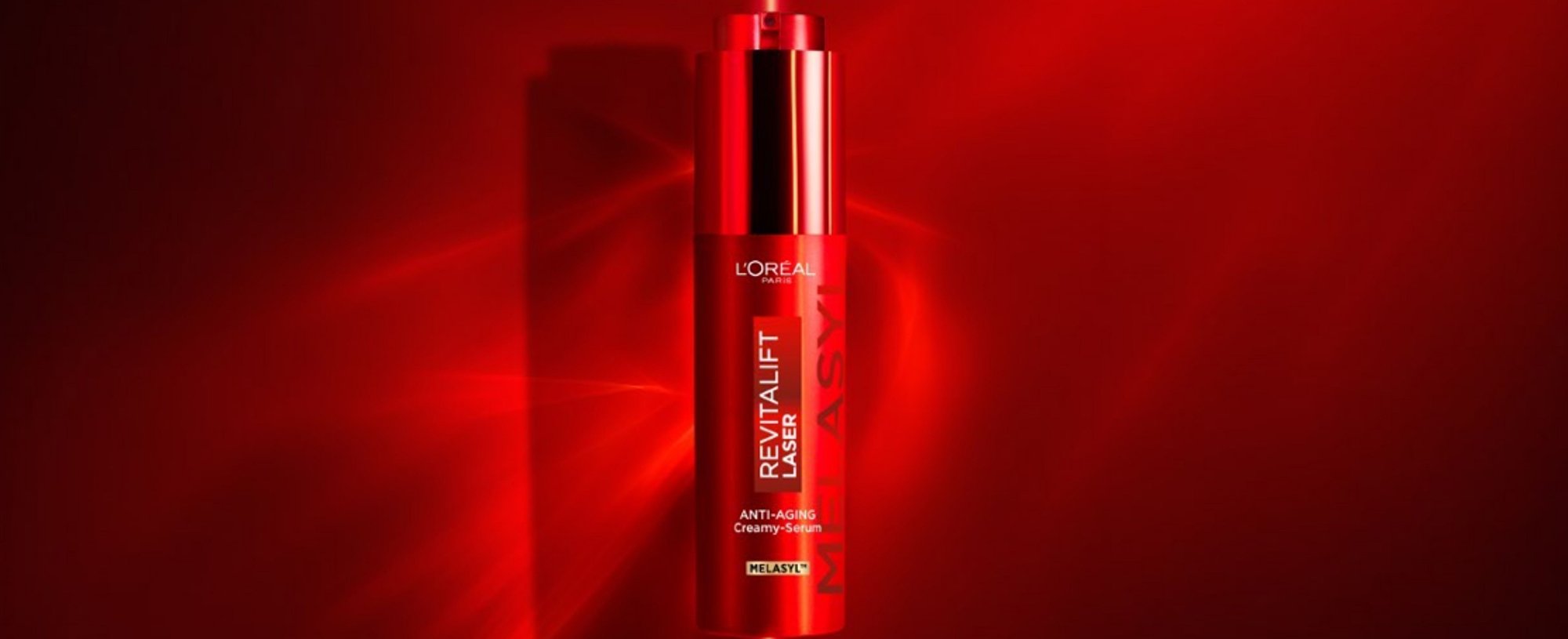 Packshot of L’Oréal Paris Revitalift Laser Triple Action Anti-Aging Creamy-Serum featuring Melasyl for advanced dark spot reduction and skin brightening.