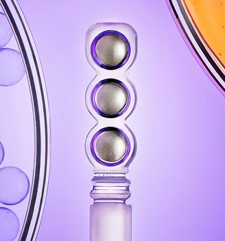L'Oréal Paris Revitalift Filler 2.5% Hyaluronic Acid + Caffeine Eye Serum displayed alongside scientific formulation graphics to show its dermatologically validated hydration benefits.