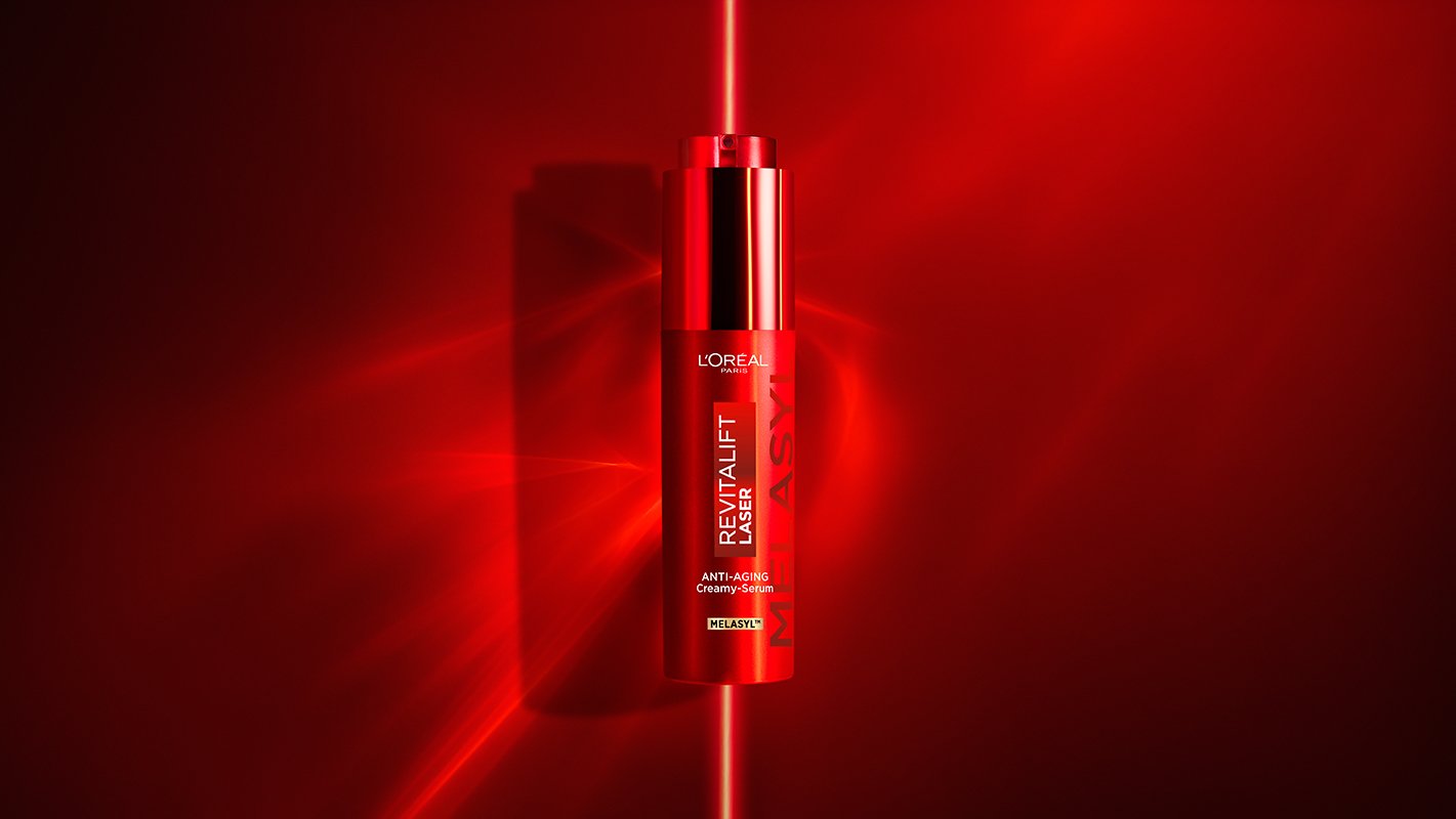 L'Oréal Paris Revitalift Laser Triple Action Serum packaging featuring Melasyl™ and Niacinamide, designed for treating dark spots and dull skin.