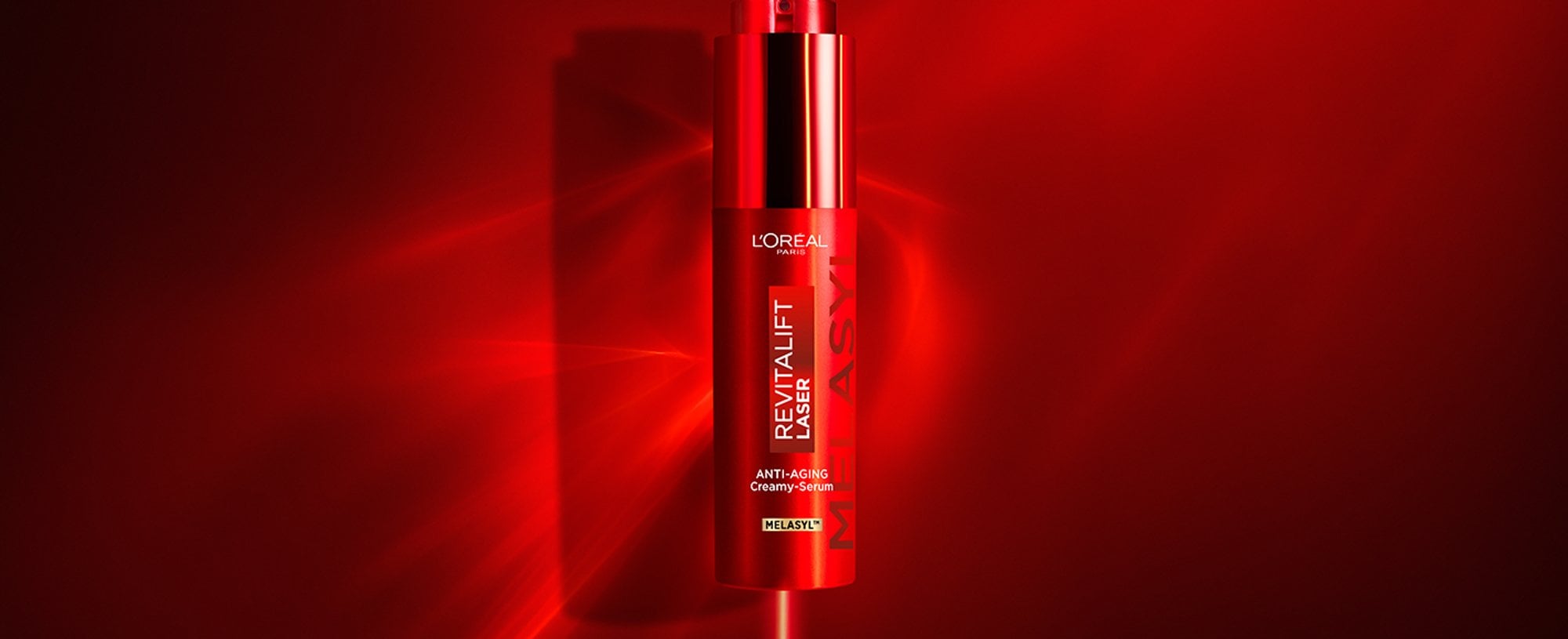 L'Oréal Paris Revitalift Laser Triple Action Serum packaging featuring Melasyl™ and Niacinamide, designed for treating dark spots and dull skin.